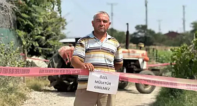 Tapulu arazisindeki yola 'özel mülk' yazısı asıp, ulaşıma kapattı